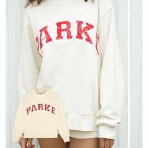 Parker Off-White Hoodie with Red Accents